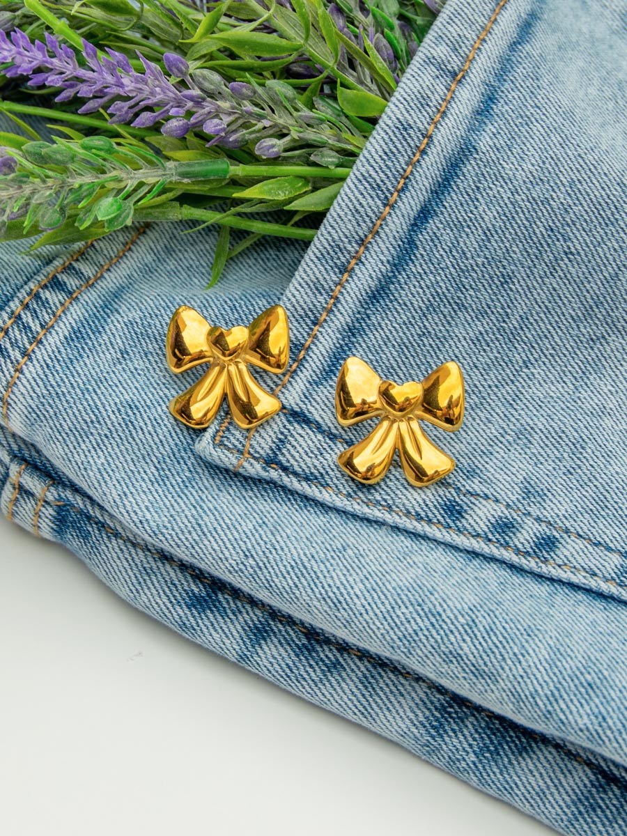 Χρυσά σκουλαρίκια σε σχήμα φιόγκου